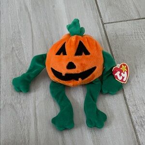 Ty Orange Pumpkin Plush with Green Limbs
RARE WITH ERRORS!